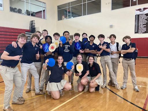 Little tennis? Big ping pong? No! It’s Pickleball!
