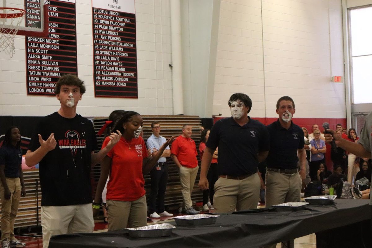 Jackson Gaeckler ‘26, Addyson Landrum ‘28, Palmer Hutchinson '27, Everett Jones ‘29 covered with whipped cream after the pie-eating contest.