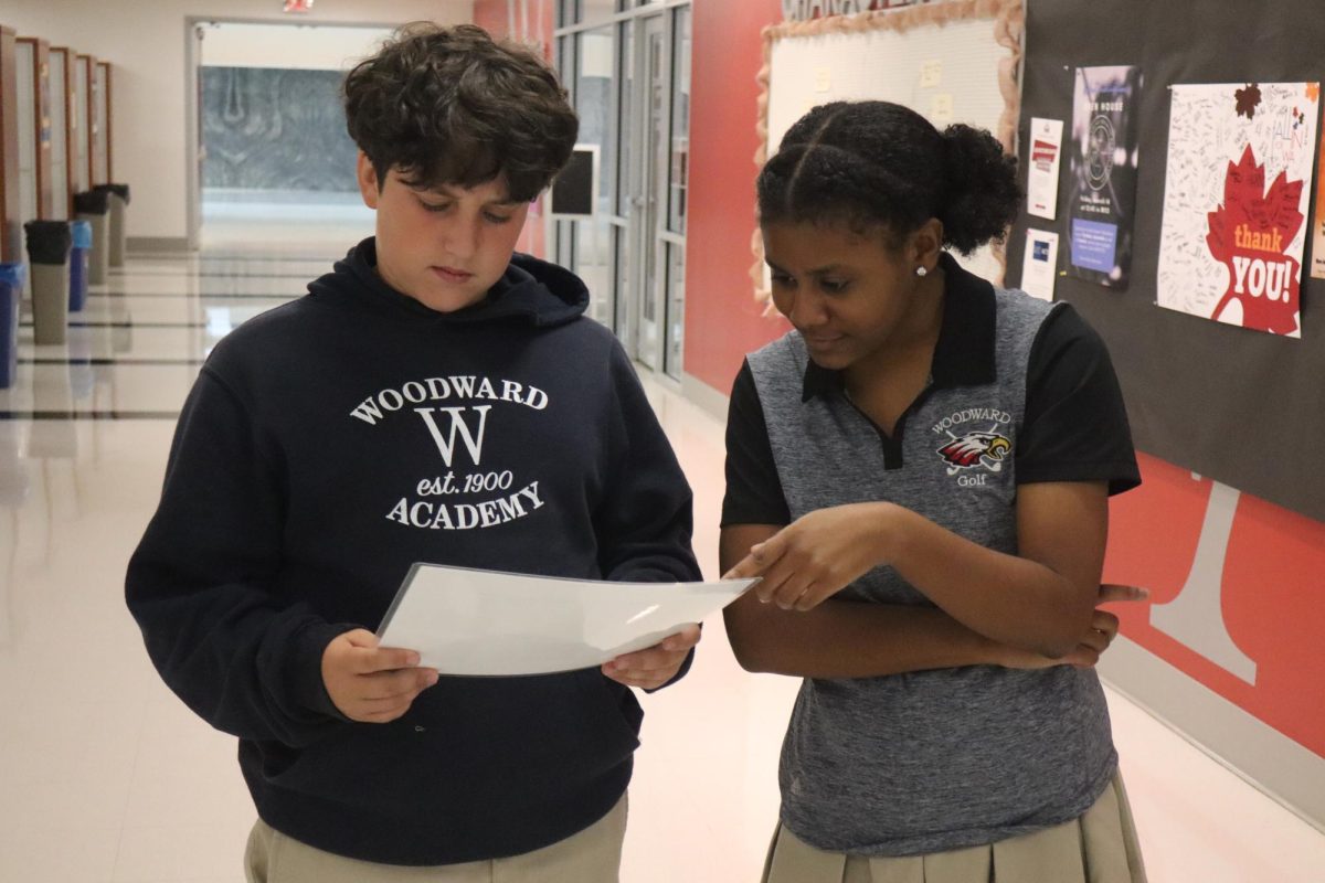 Shaw Gordon ‘29 and Riley Jones ‘26 (left to right) look at Shaw’s schedule in an attempt to get him to his correct class. As a freshman, Shaw doesn’t know where all of his classes are yet, but it's okay because Riley is willing to step in and get him to class on time. Sept. 19, 2025.
