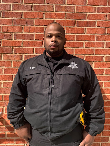 Officer Issac Gray during his patrol time outside the Student Lounge during lunch on Feb. 24, 2026. Photo Credit Joy Ferguson ‘29.
