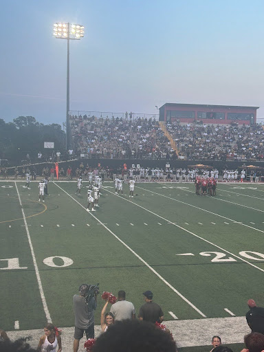 Woodward’s football team in their 2024 season opener against Carrollton High School. Photo courtesy of Brett Schlossberg ‘26.